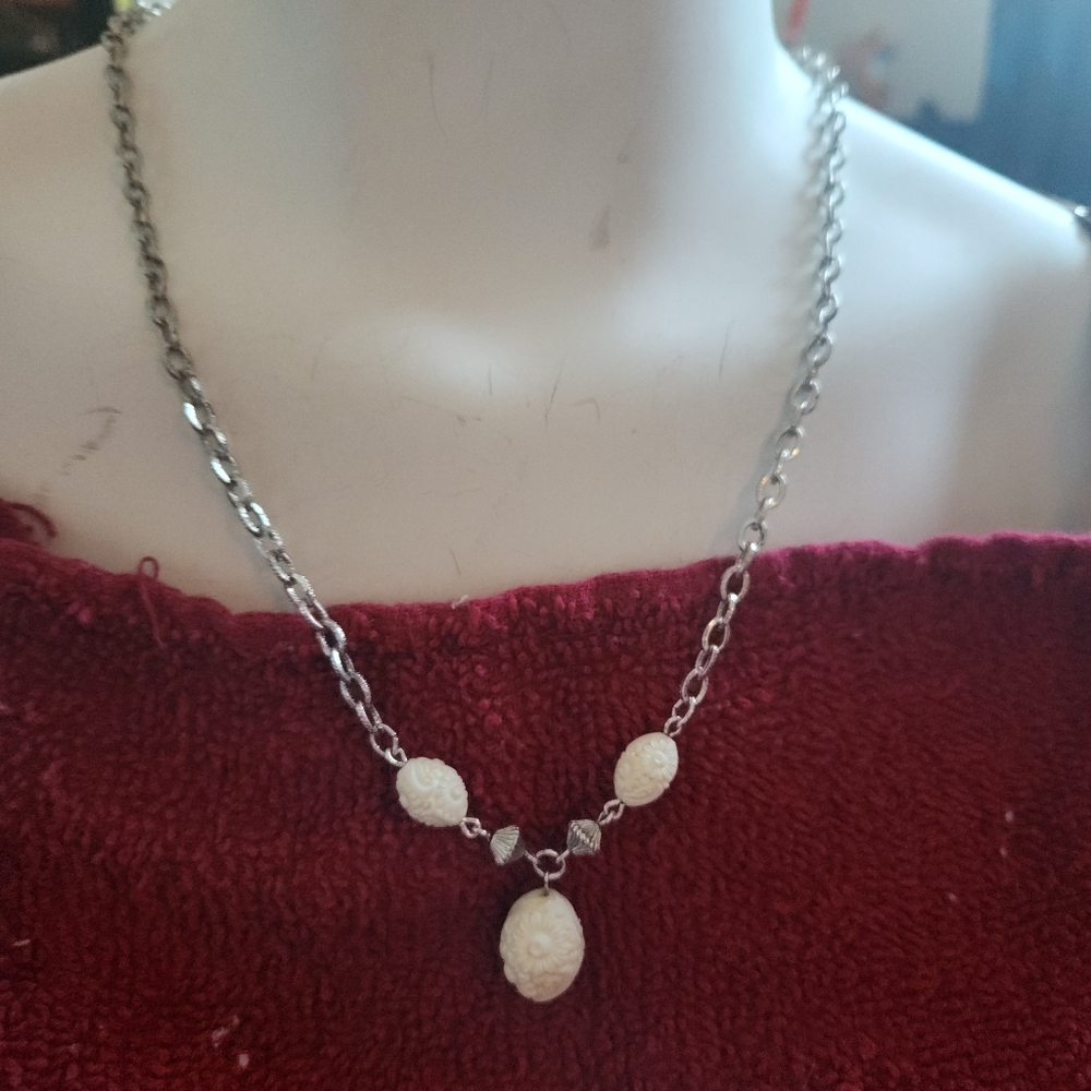 Elegant Silver Necklace with Cream Accents